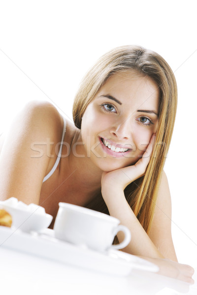 улыбающаяся женщина завтрак молодые красивая женщина кровать женщины Сток-фото © stokkete