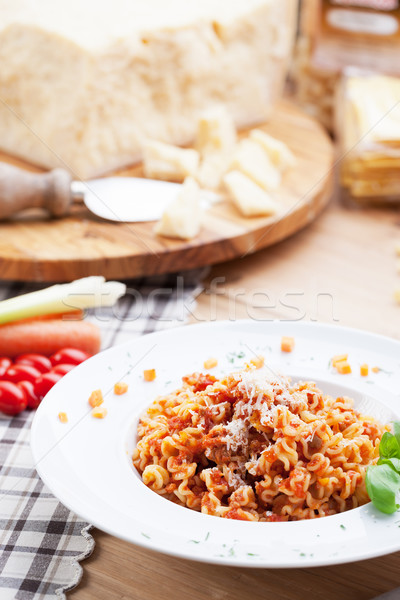 Tészta paradicsomszósz olasz étel parmezán sajt étel vacsora Stock fotó © stokkete
