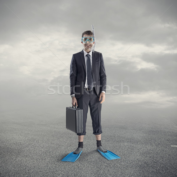 Diving businessman Stock photo © stokkete