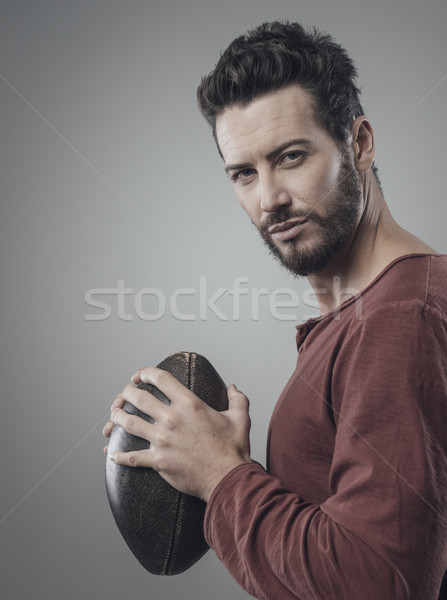 Attractive young fotball player Stock photo © stokkete
