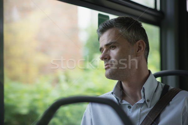Ingázás munka töprengő üzletember ül busz Stock fotó © stokkete