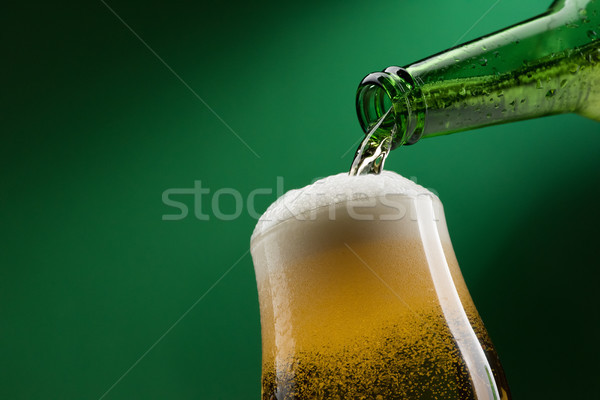 Pouring beer into a glass Stock photo © stokkete