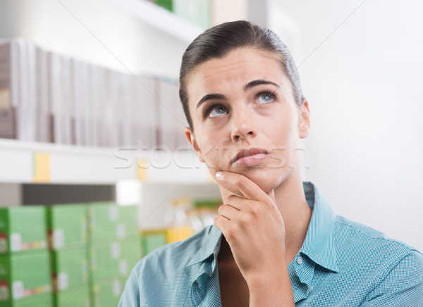 Pensive woman at store Stock photo © stokkete