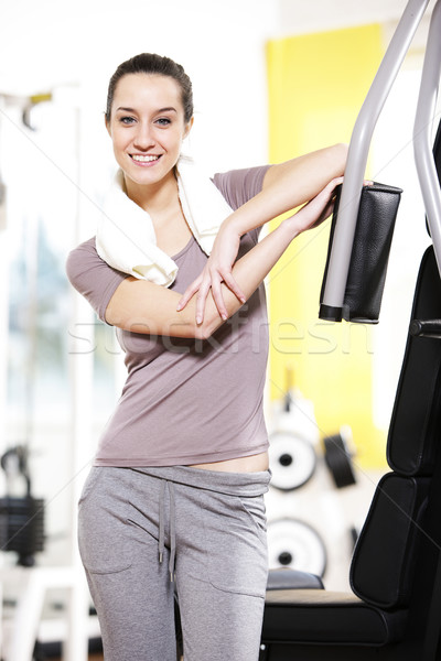 fitness portrait: A young female stays fit. Stock photo © stokkete