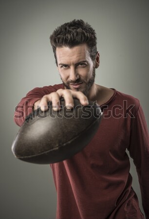 Fresco joven arma agresivo hombre Foto stock © stokkete