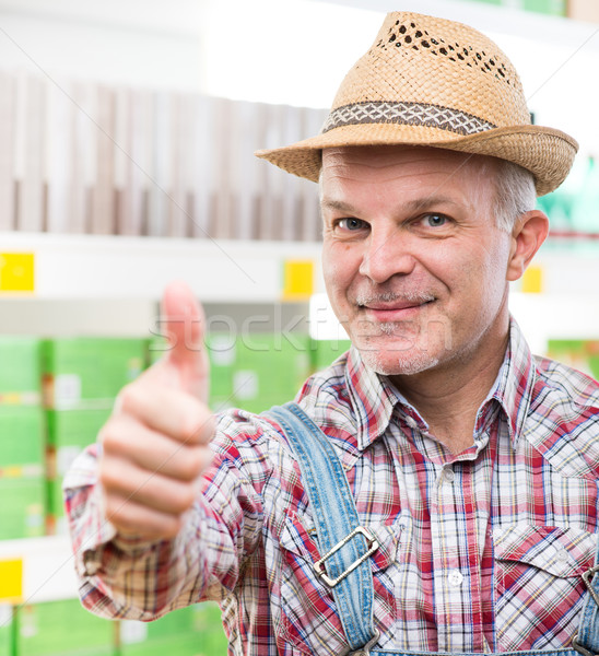 Farmer at supermarket thumbs up Stock photo © stokkete
