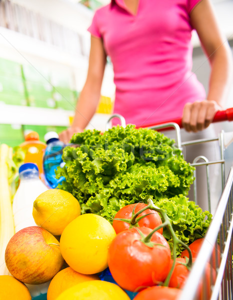Shopping cart filled with vegetables and fruit Stock photo © stokkete