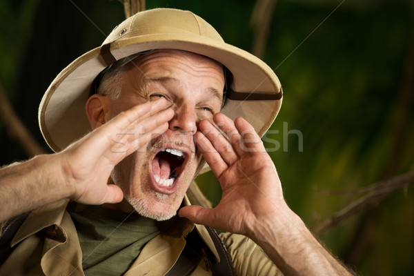 Abenteurer schreien Dschungel heraus laut Hände Stock foto © stokkete