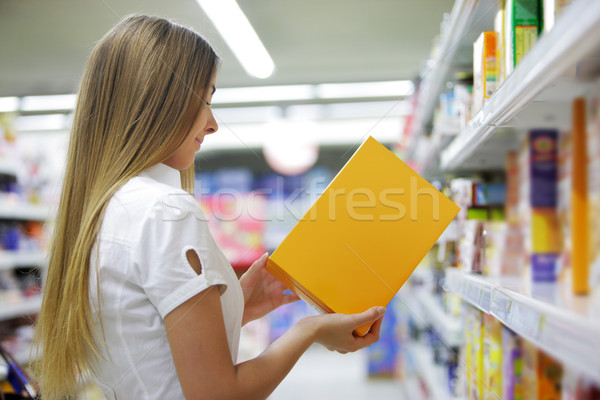 Stock photo: Woman in a Grocery Store