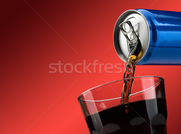 Pouring a soft drink in a glass Stock photo © stokkete