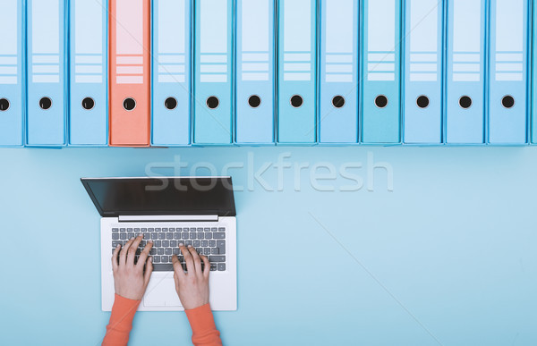 Searching files in the archive using a laptop Stock photo © stokkete