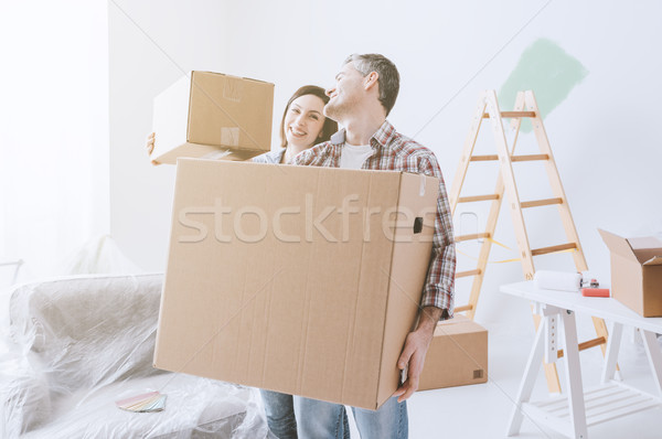 Paar bewegen glücklich home tragen Stock foto © stokkete