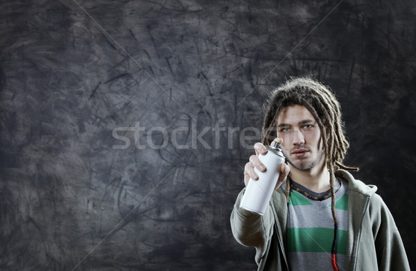 Graffiti kunstenaar jonge man exemplaar ruimte man portret Stockfoto © stokkete
