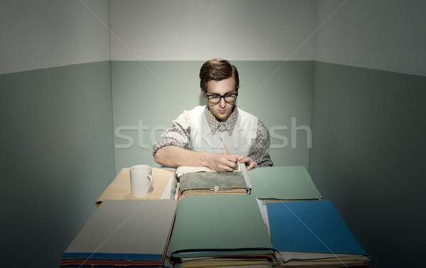 Nerd facet biurko młody człowiek mały smutne Zdjęcia stock © stokkete