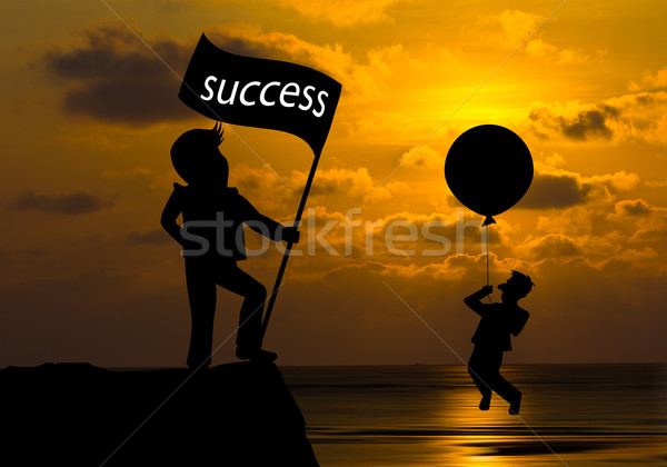 Stock photo: Concept skyline ,Cartoon man flying away by using balloon and ma