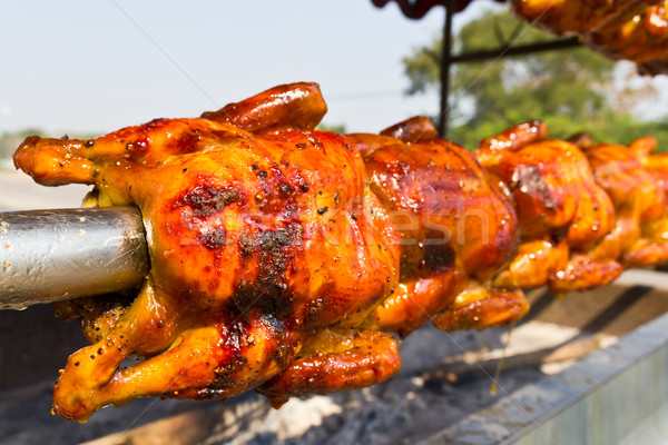 Chicken roasted on the spit  Stock photo © stoonn