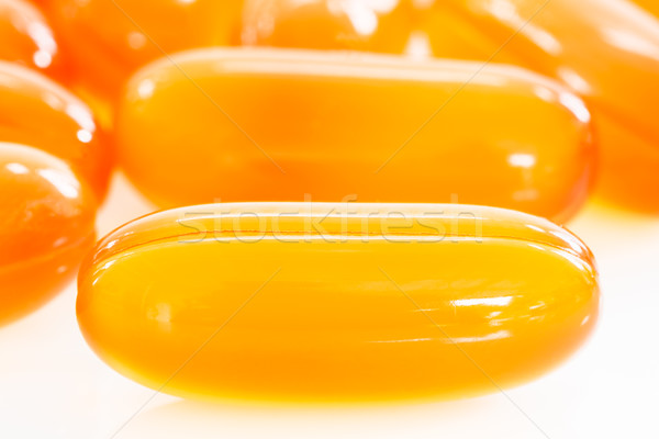 Close up capsules gel on white background Stock photo © stoonn