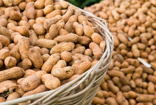 Peanuts in basket Stock photo © stoonn