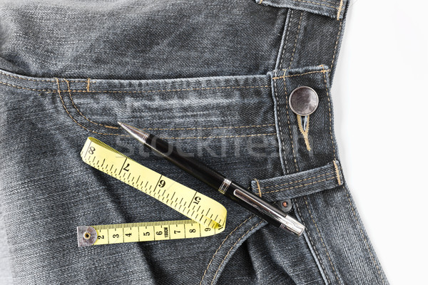 Jeans and measuring tape Stock photo © stoonn