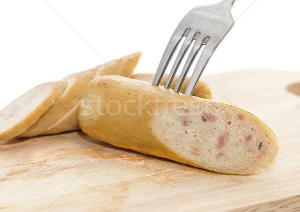 Sausage on a fork and cutting board Stock photo © stoonn