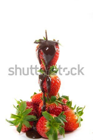 Tower of strawberries with melted chocolate Stock photo © Stootsy