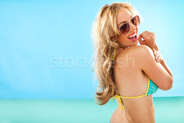Dai capelli lunghi donna bikini indietro spalla Foto d'archivio © stryjek