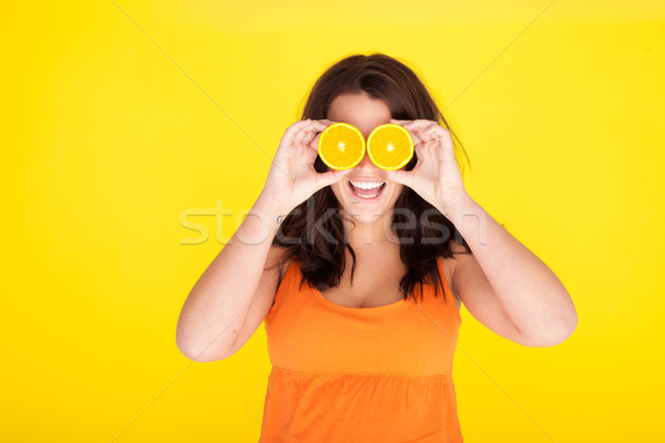 Fun Concept Model With Orange Slices For Eyes Stock photo © stryjek
