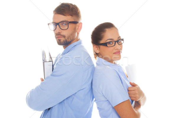 Professional couple holding documents Stock photo © stryjek