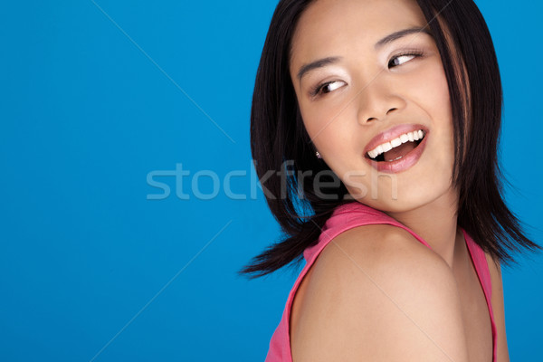 Vivacious laughing Asian woman Stock photo © stryjek