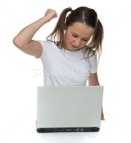 Boos jong meisje laptop computer vuist frustratie geïsoleerd Stockfoto © stryjek