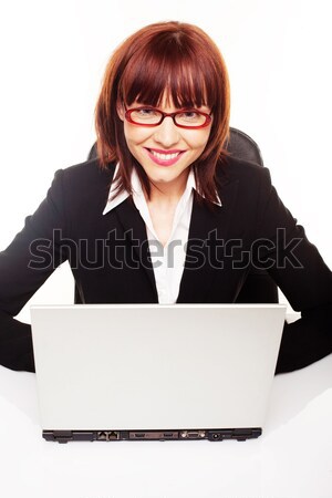 Foto stock: Sonriendo · mujer · de · negocios · gafas · sentado · portátil