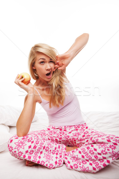 Kobieta jabłko dość młoda kobieta piżama Zdjęcia stock © stryjek