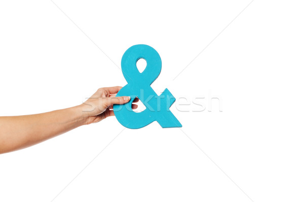 hand holding up an ampersand from the left Stock photo © stryjek