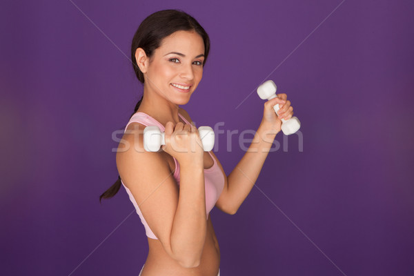Vrouw gewichten aantrekkelijk atletisch jonge vrouw Stockfoto © stryjek