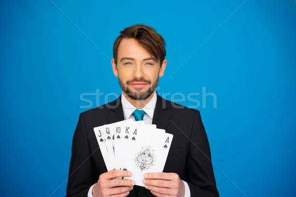 young business man showing playing cards Stock photo © stryjek