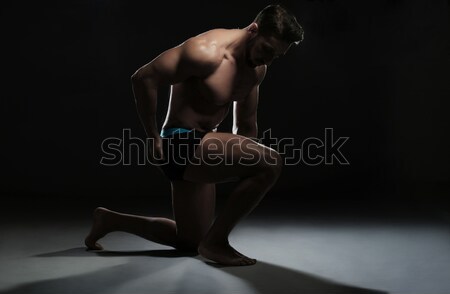 Topless muscular om şedinţei yoga pozitie Imagine de stoc © stryjek