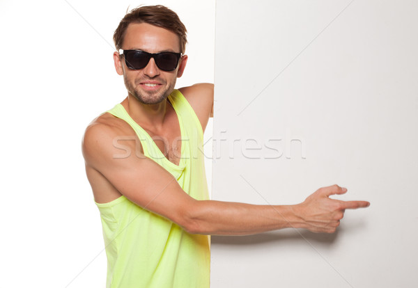 Casual man in sunglasses with a blank sign Stock photo © stryjek