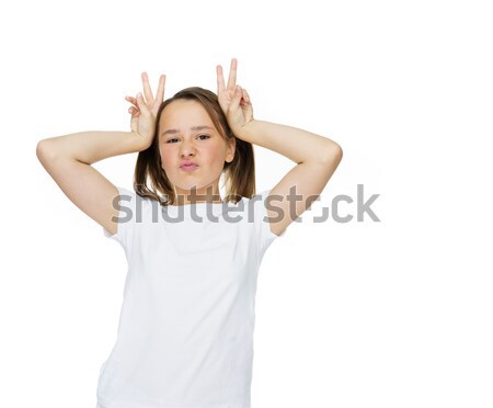 Young girl making a horns gesture Stock photo © stryjek