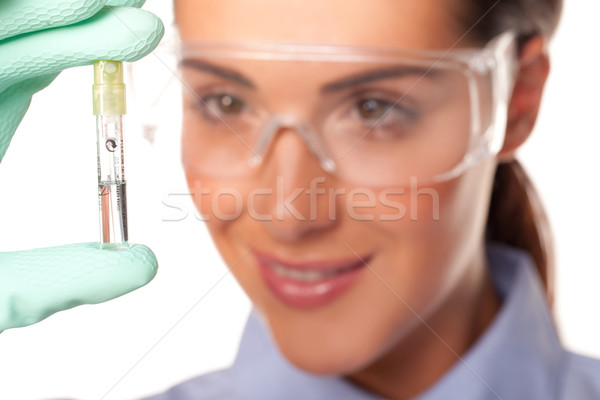 Laboratórium technikus megvizsgál kémcső vonzó nő tart Stock fotó © stryjek
