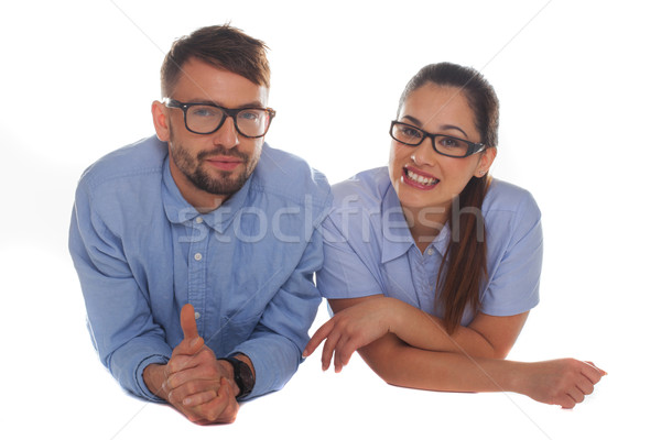 Stock photo: Nerdy looking couple looking at camera