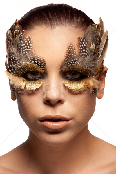 Woman wearing creative feather make-up Stock photo © stryjek