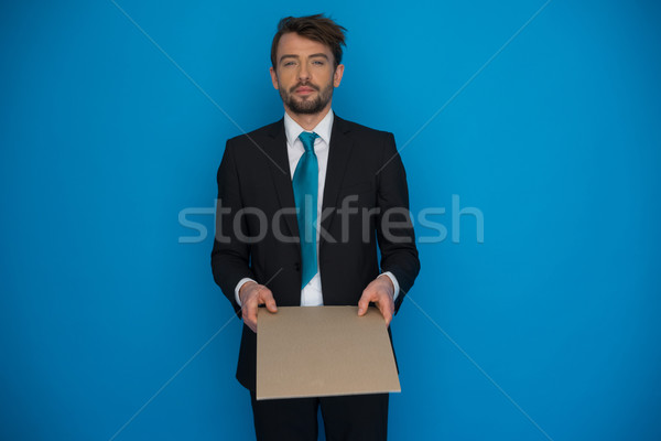 Empresario anunciante azul sonrisa signo Foto stock © stryjek