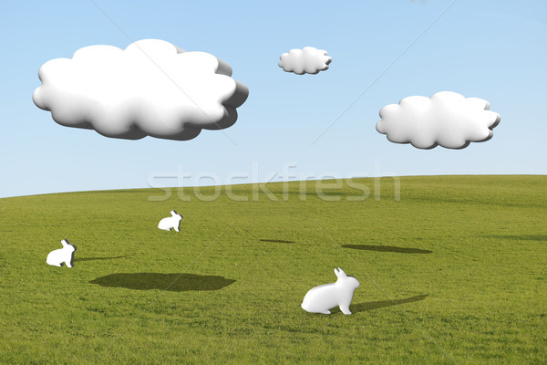 Three white rabbits on grass under cumulus clouds Stock photo © stryjek