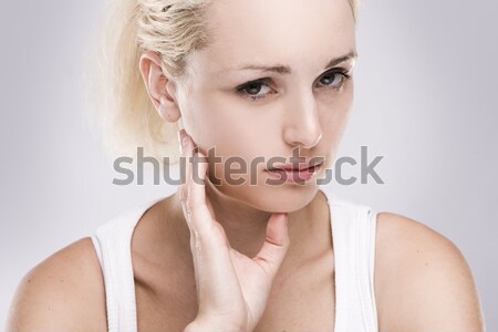 Retrato caucasiano mulher loira dor de dente cinza menina Foto stock © stryjek