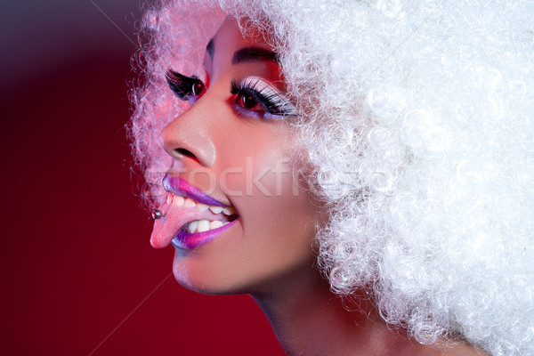 African Woman With Pierced Tongue And Wig Stock photo © stryjek