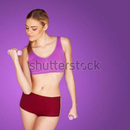 Fit woman carrying exercise equipment Stock photo © stryjek