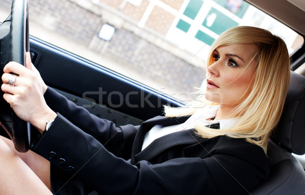 Сток-фото: красивой · деловая · женщина · вождения · автомобилей · сидящий · за