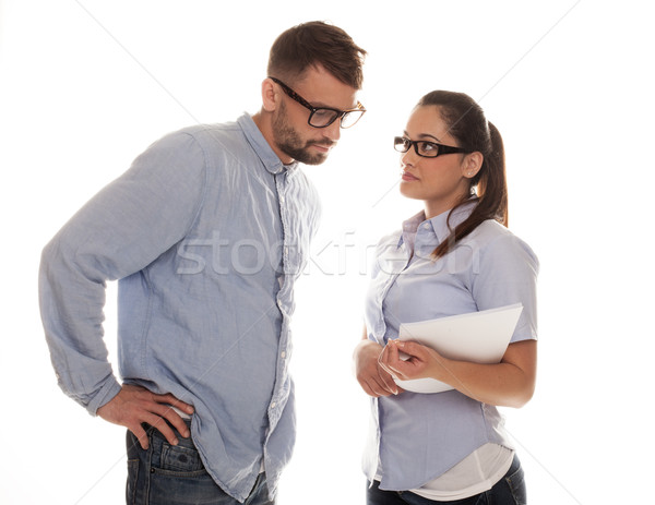 Serious couple in glass having a discussion Stock photo © stryjek