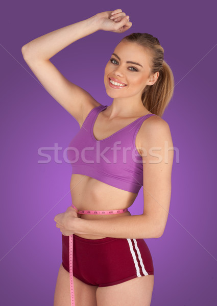 Woman taking body measurements Stock photo © stryjek