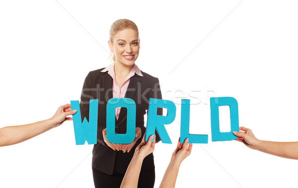 Smiling woman with the word WORLD Stock photo © stryjek